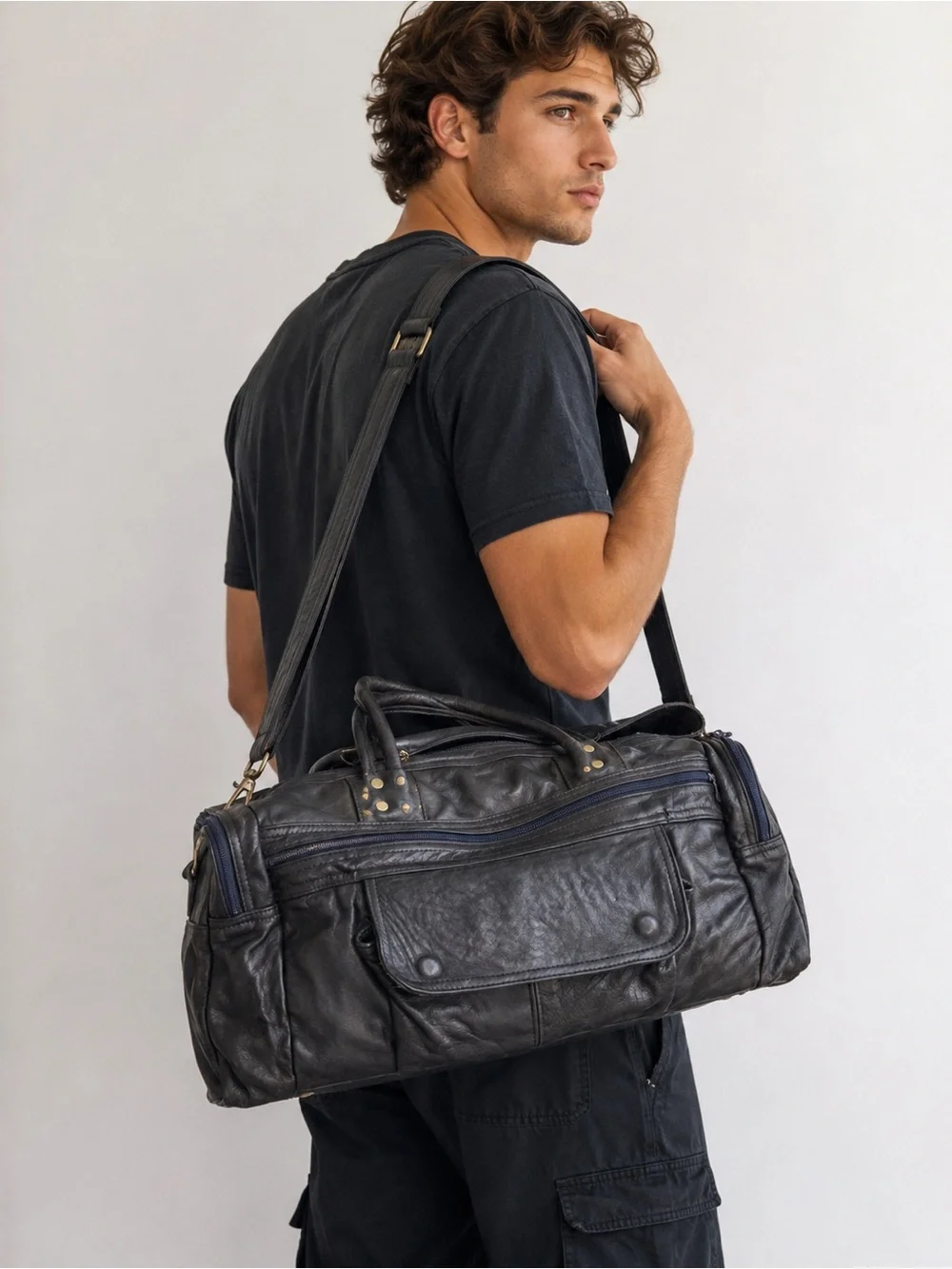 Classic Black Leather Duffel with Adjustable Shoulder Strap